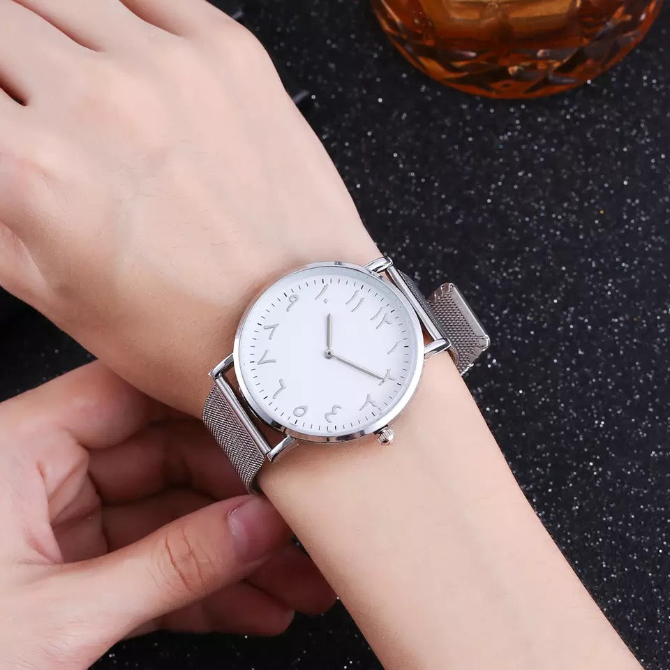 Clock with Arabic numerals